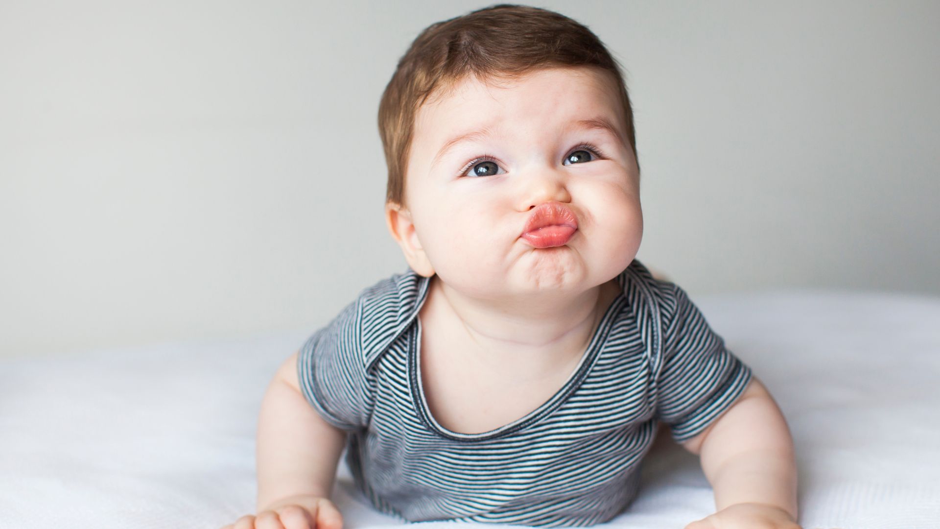 when do babies start rolling over and crawling